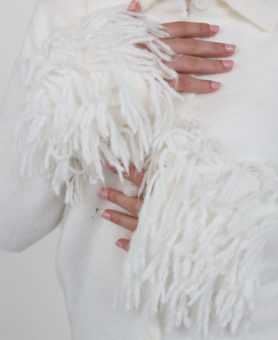 Blouse with fringe on the sleeves