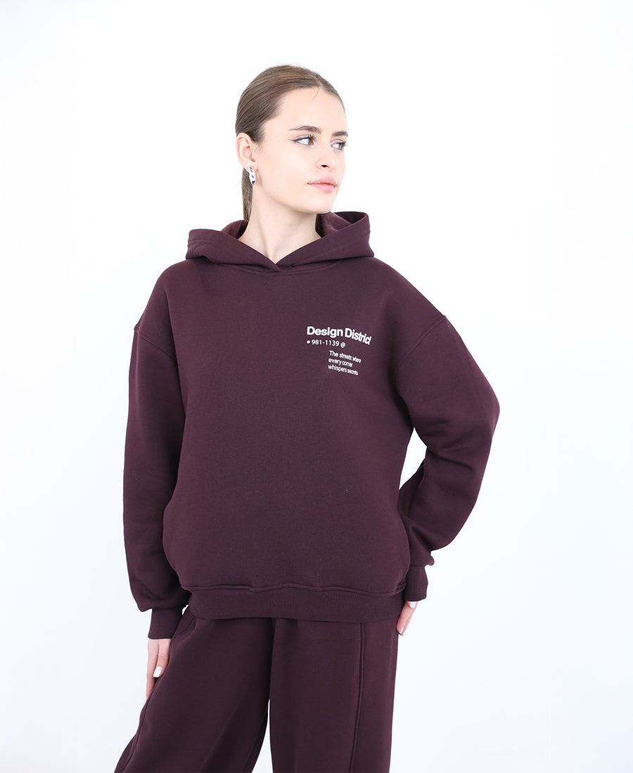 Maroon hoodie with printed words