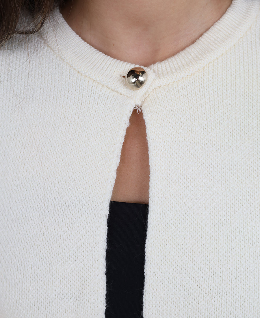 Knitted blouse with tassels