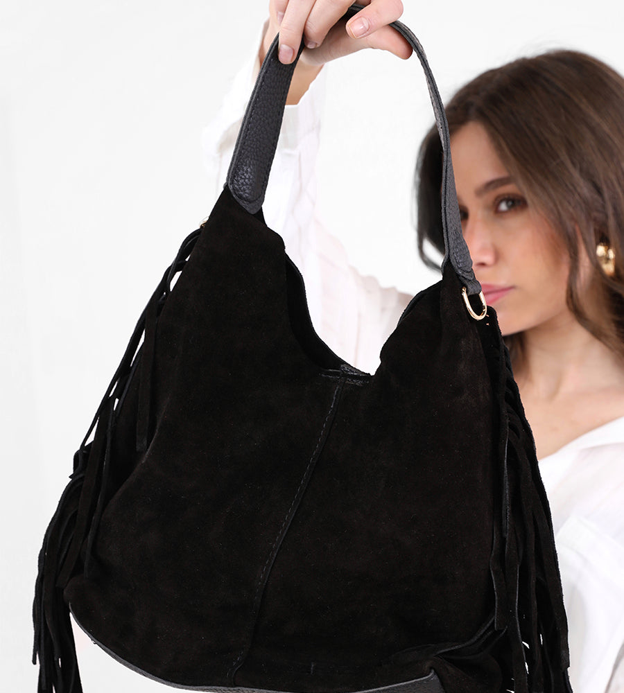 Suede leather handbag with side tassels