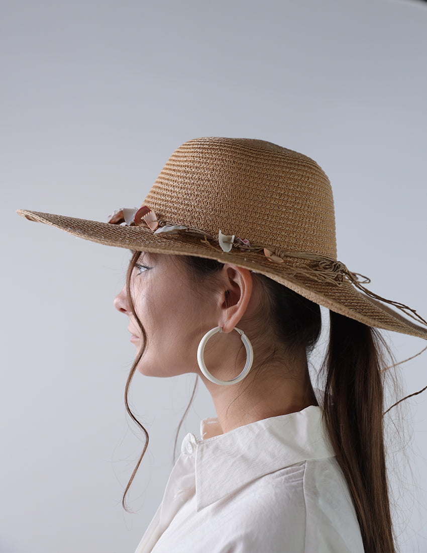 Dark beige priest's hat with a seashell tie