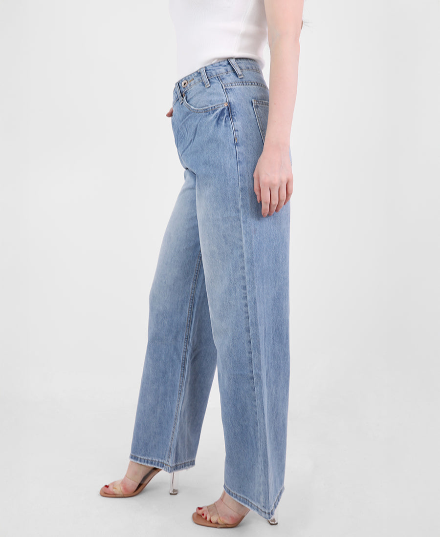 Straight-leg jeans with a slanted waist and button.