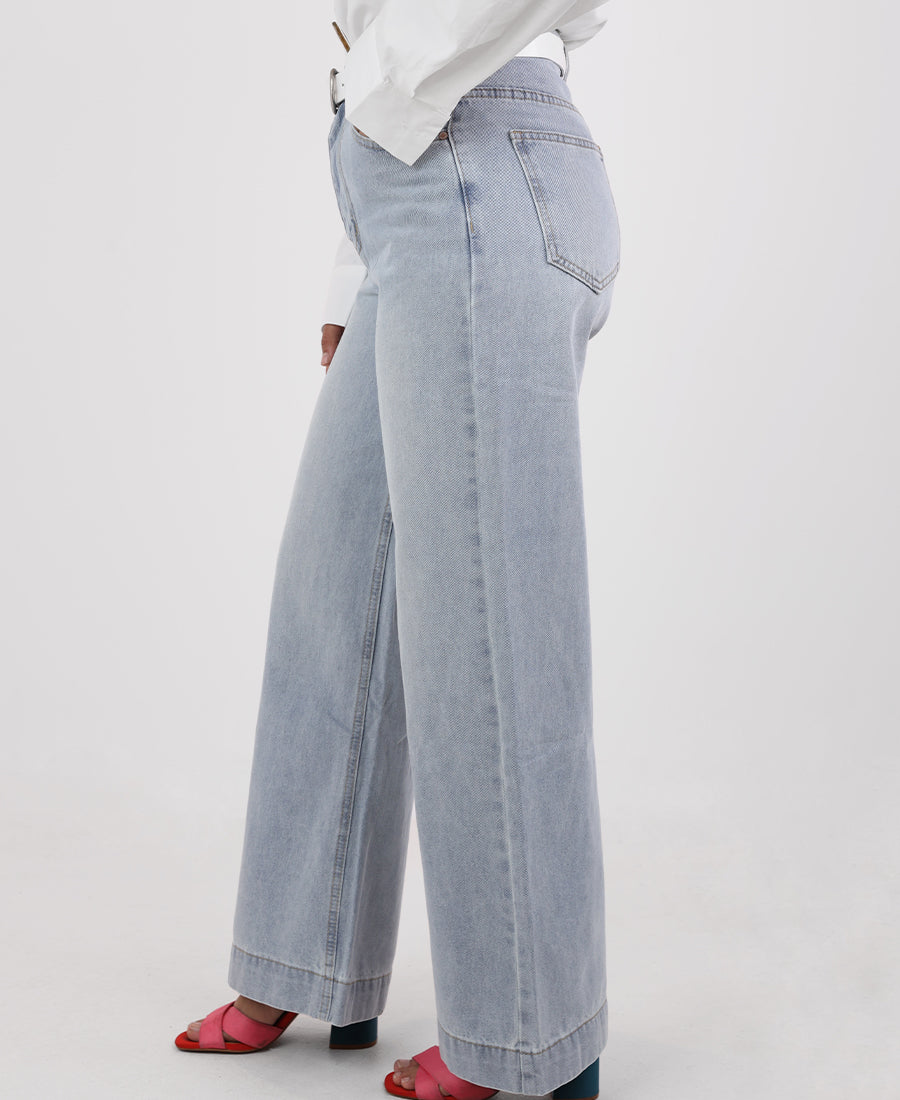 Straight-leg jeans with a white belt