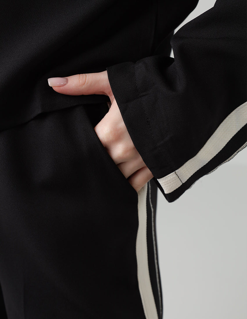 Black jacket and pants set with a side stripe