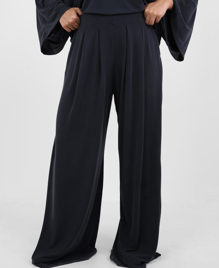 Wide leg trousers with an elasticated pleated waist