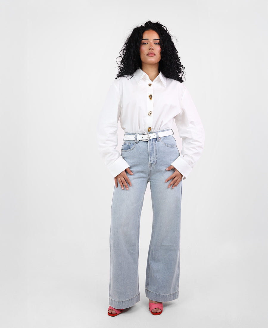 Shirt with assorted buttons and gold trim