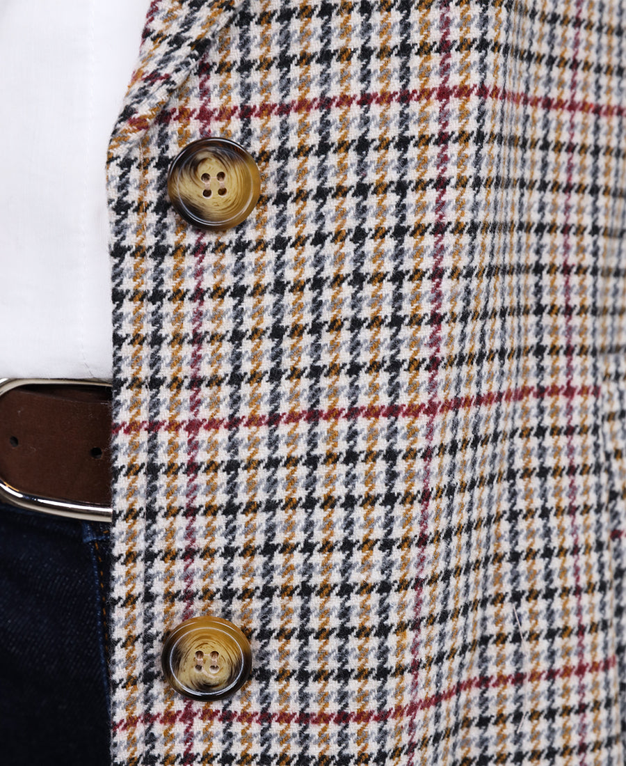 Long striped jacket with a belt at the waist