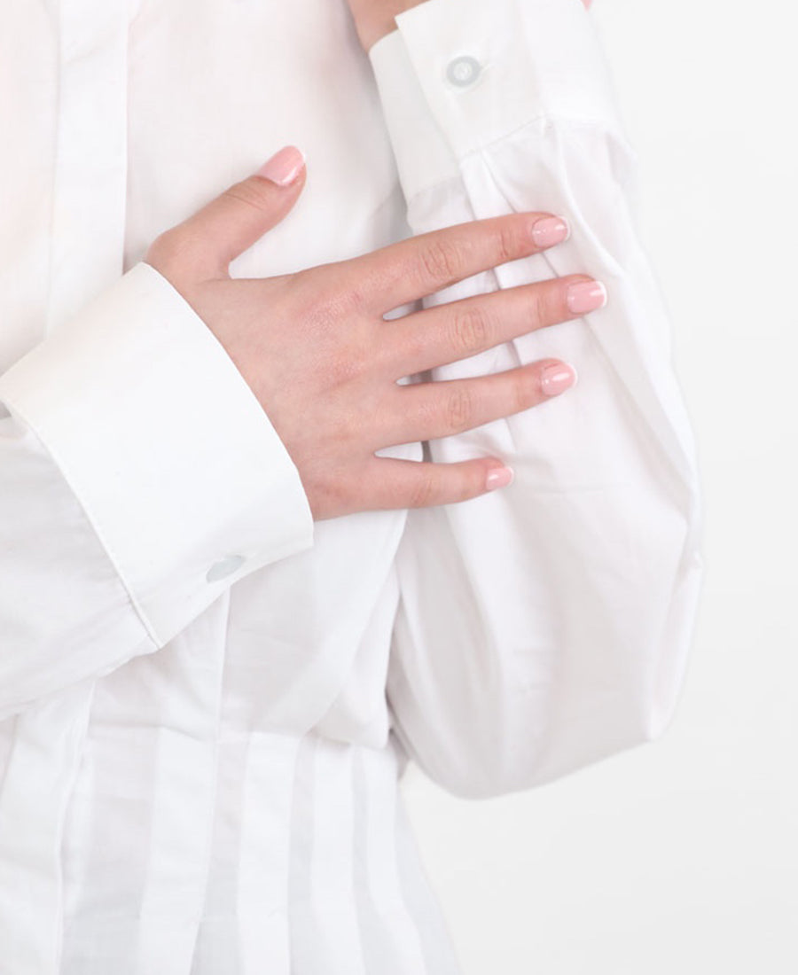 White shirt tied at the waist