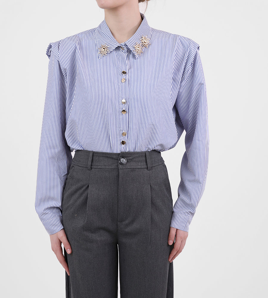 Striped shirt with sun brooch