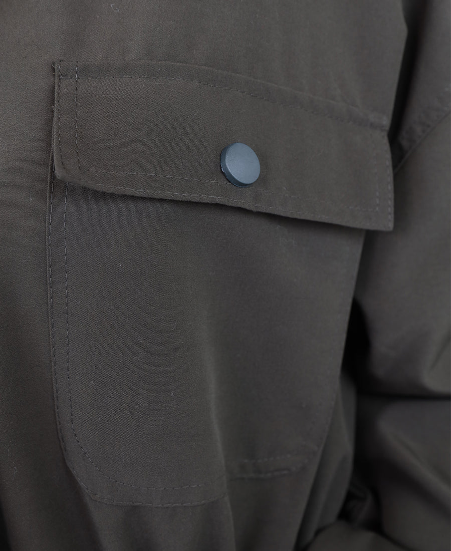 Long jacket with a gathered waist and pocket