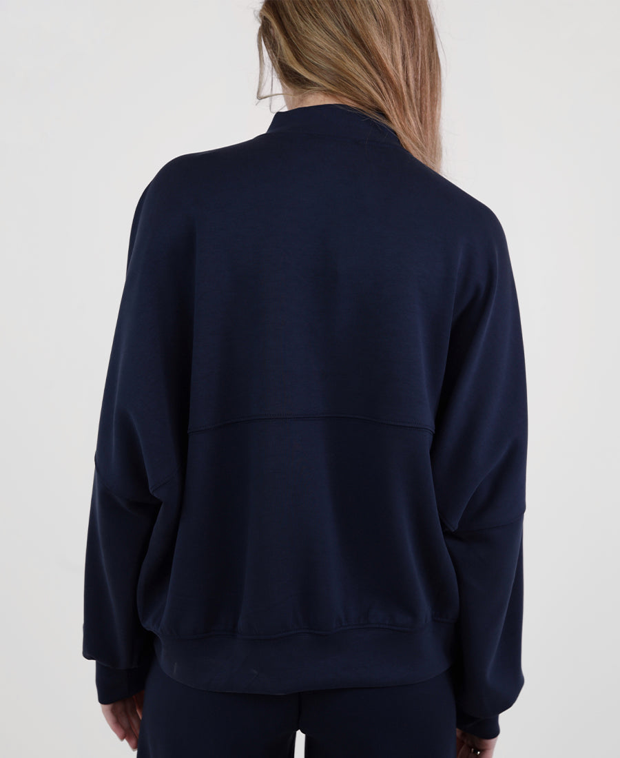 Over-size sweater with a zippered line down the middle