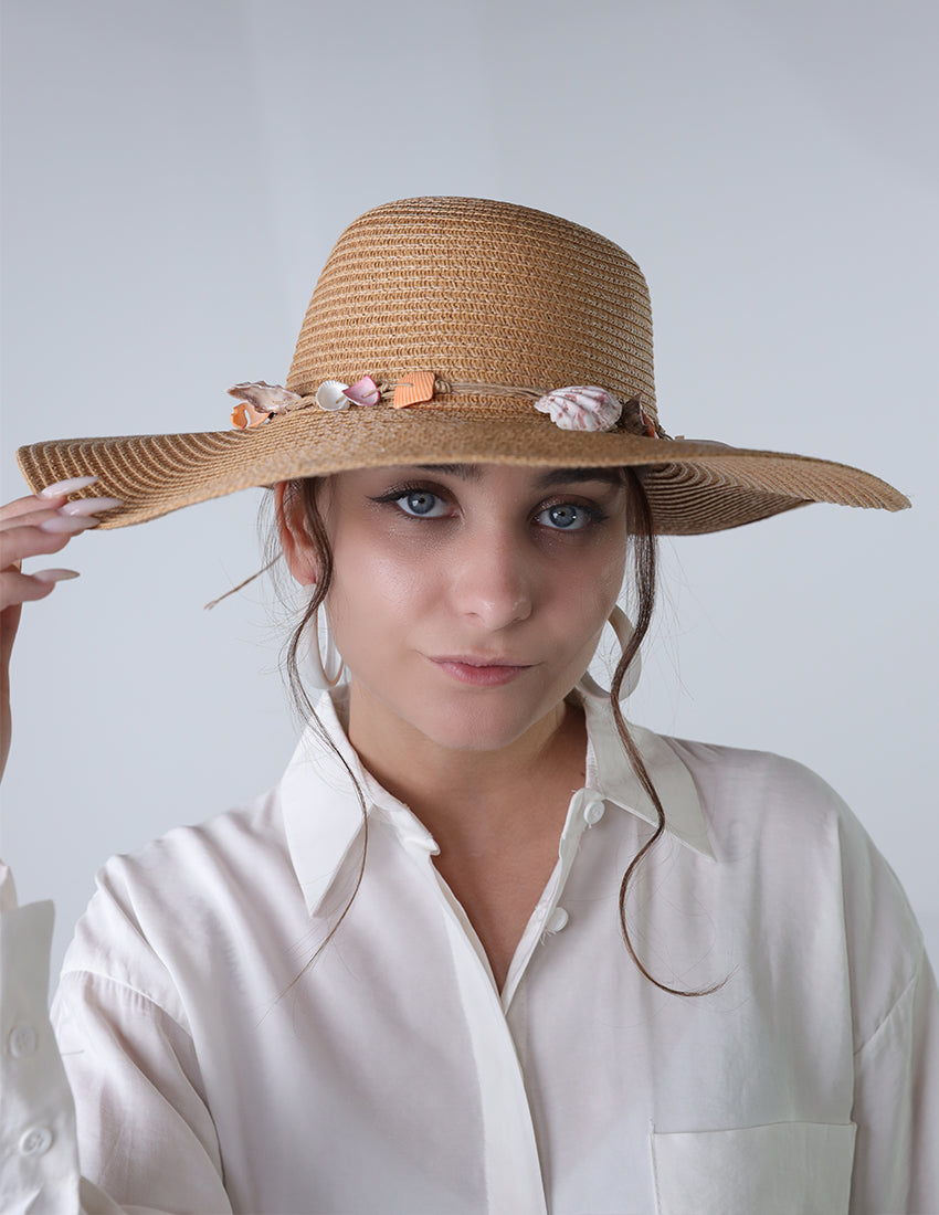 Dark beige priest's hat with a seashell tie