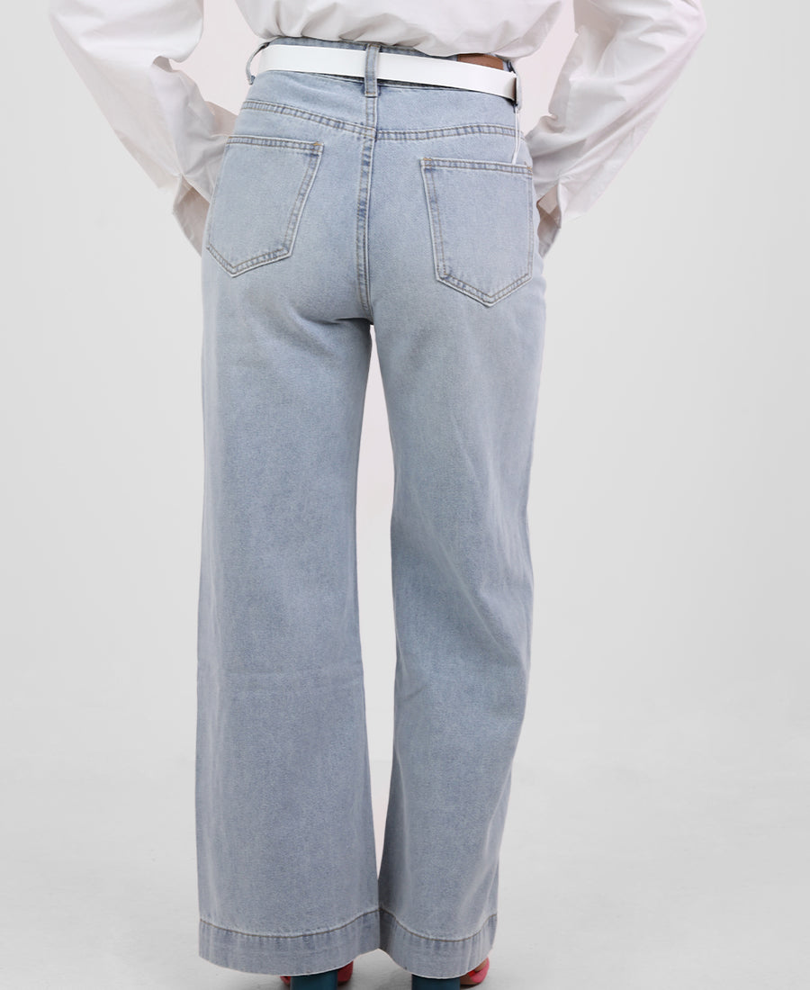 Straight-leg jeans with a white belt