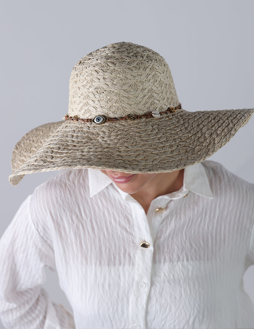 Beige priest's hat with eye patch