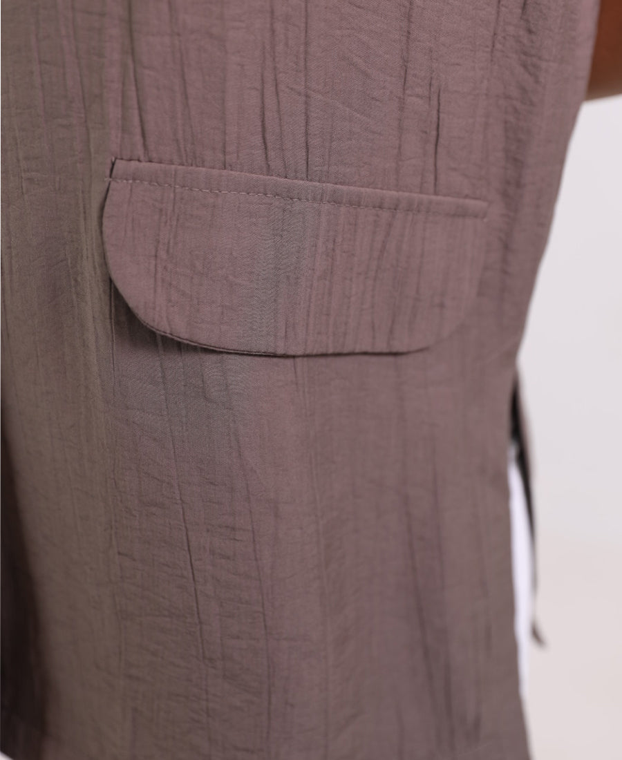 Long vest with golden button