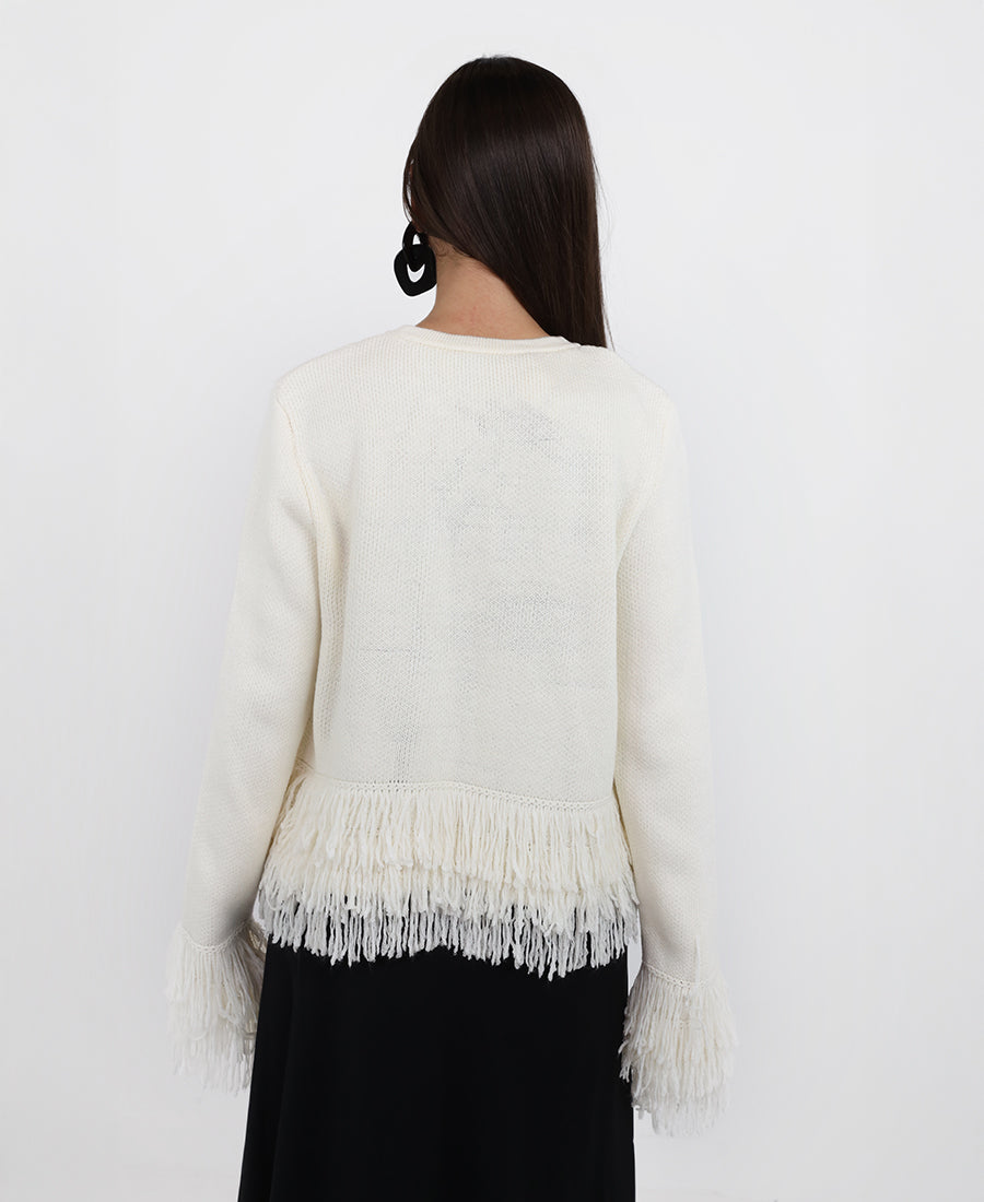 Knitted blouse with tassels
