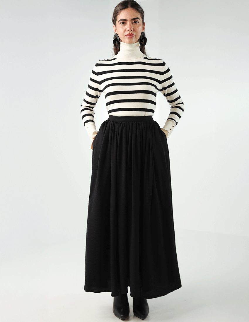 Long pleated flowy skirt