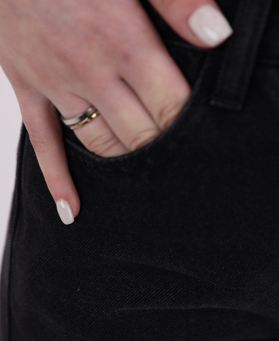 Black straight jeans with a side stripe