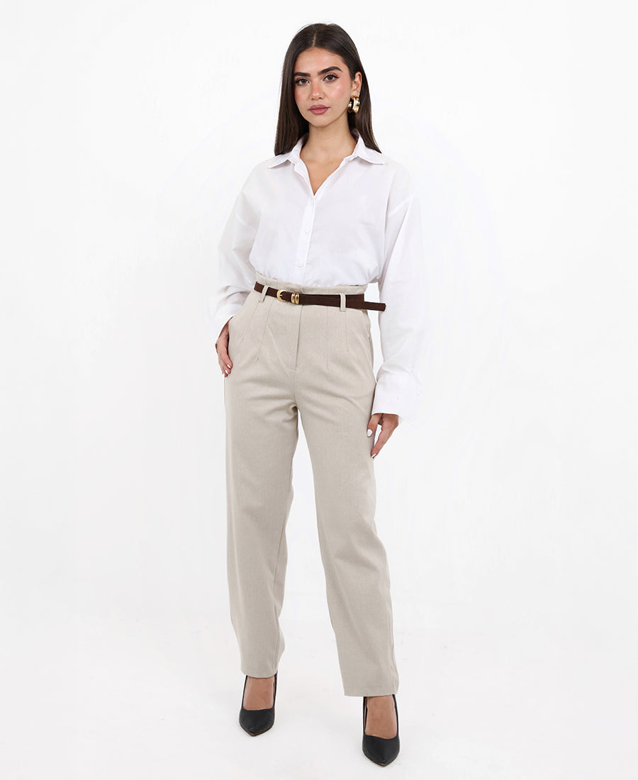 pleated trousers with a brown belt