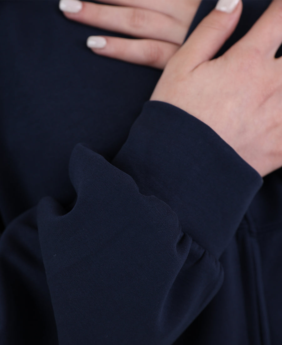 Over-size sweater with a zippered line down the middle