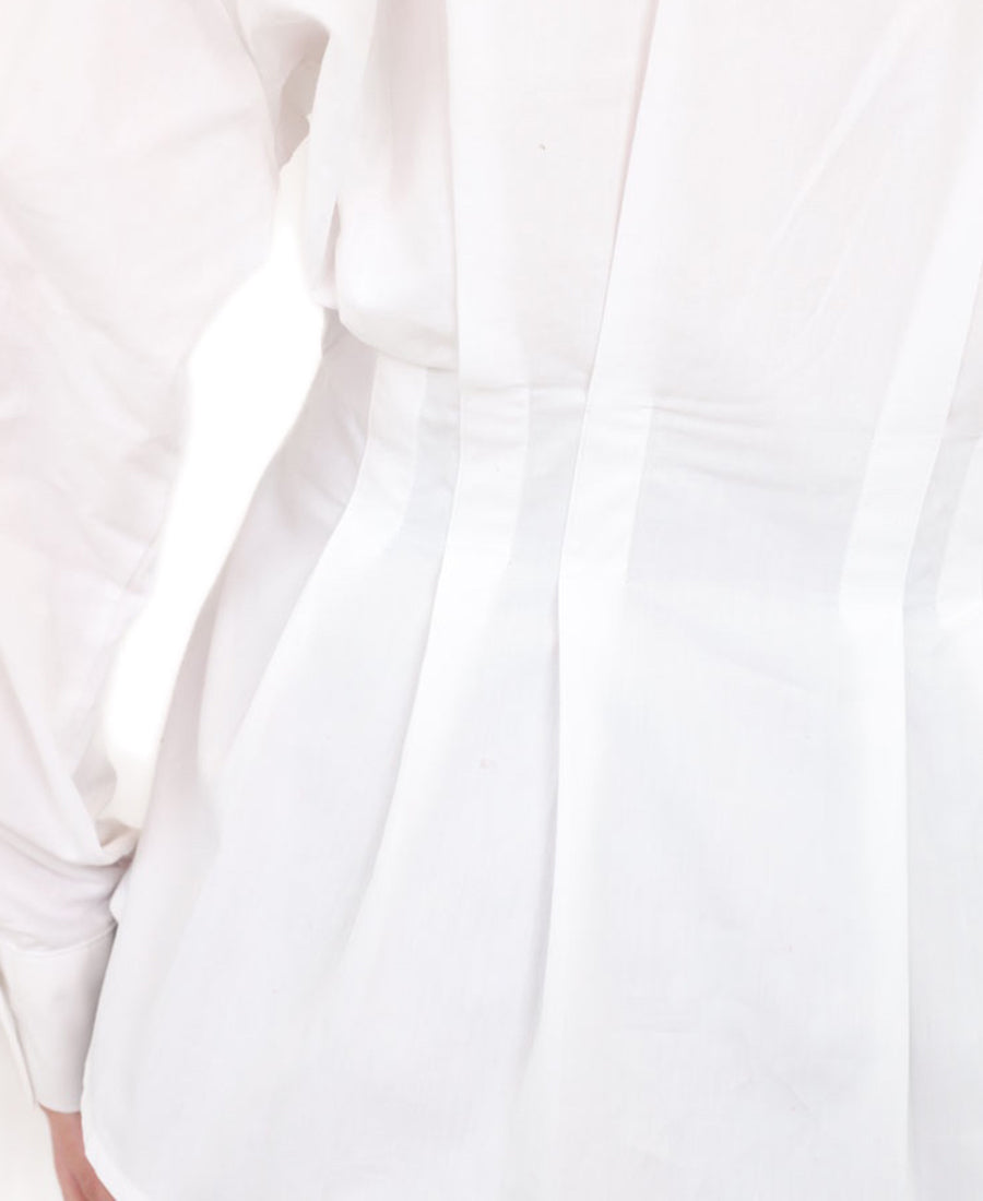 White shirt tied at the waist