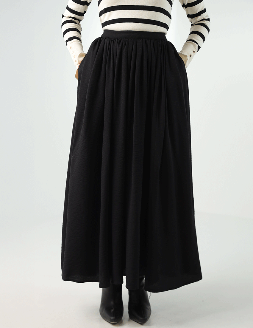 Long pleated flowy skirt
