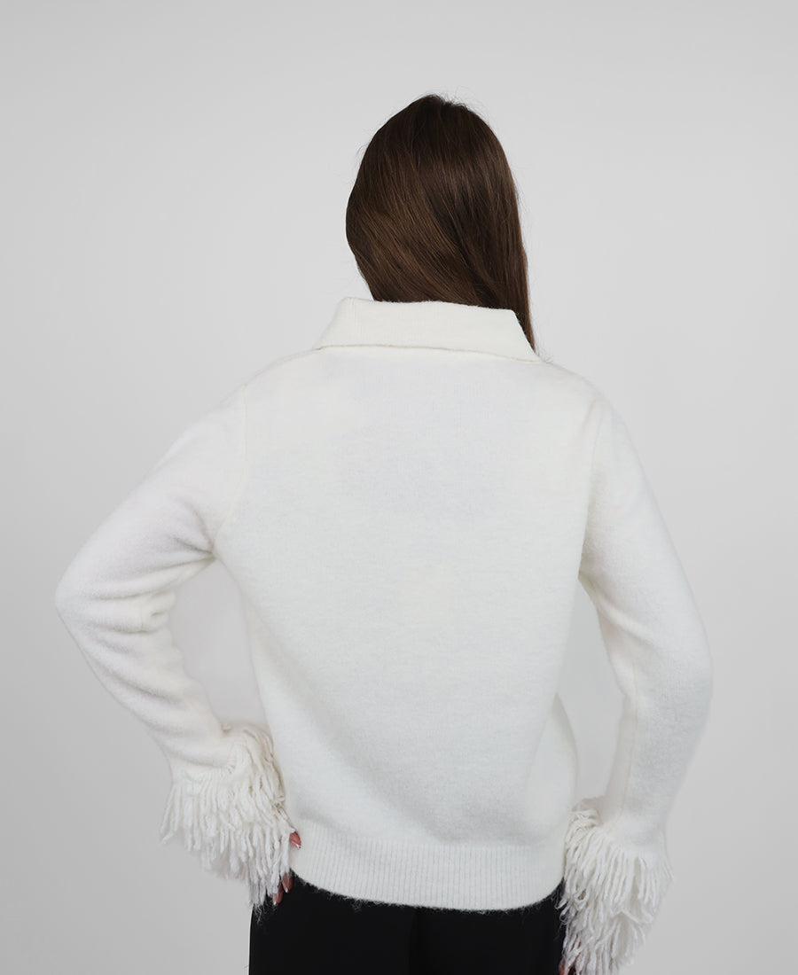 Blouse with fringe on the sleeves