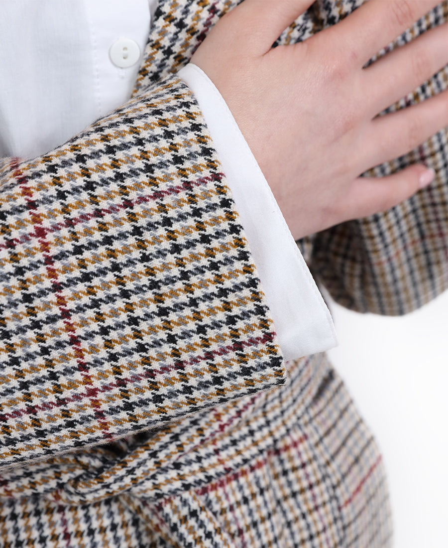 Long striped jacket with a belt at the waist