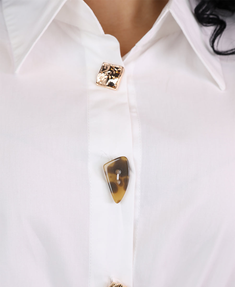 Shirt with assorted buttons and gold trim