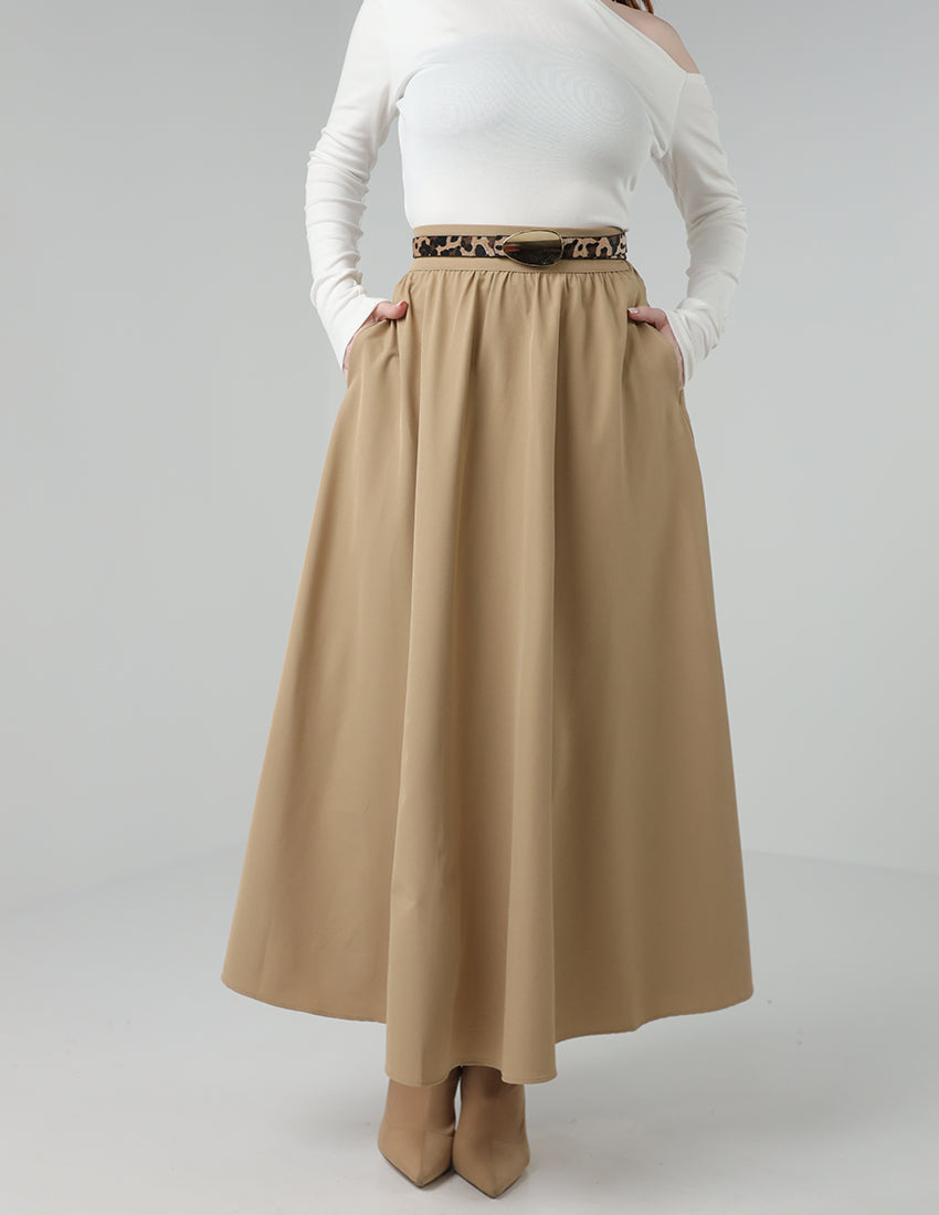 Long pleated beige skirt