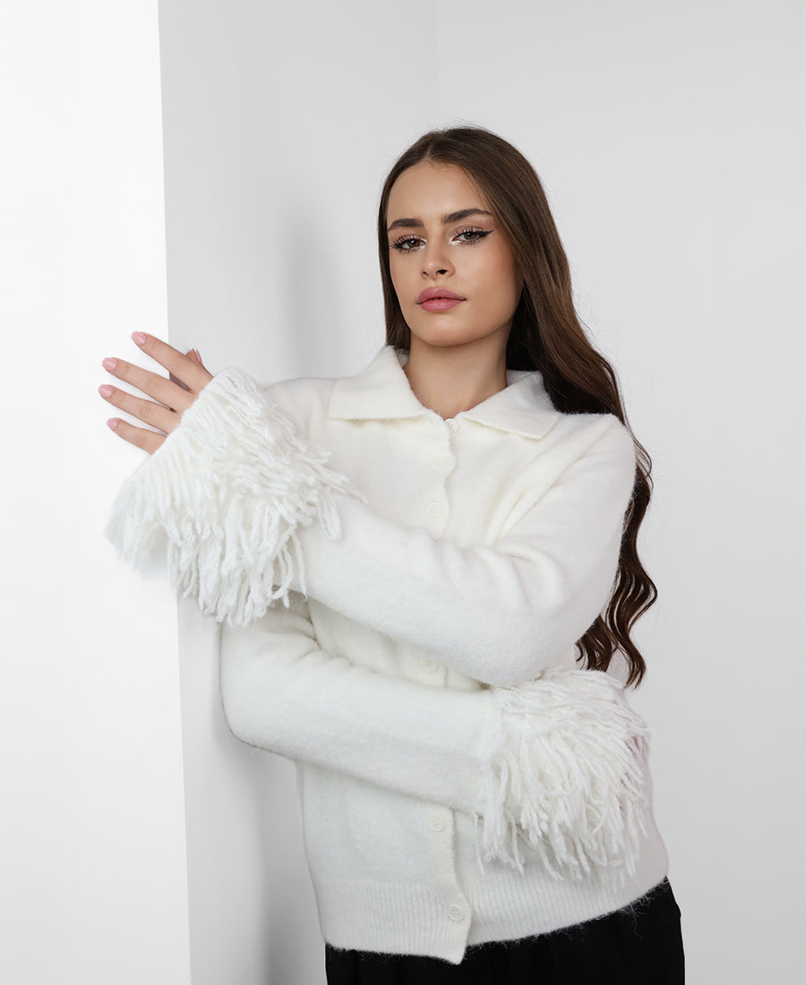 Blouse with fringe on the sleeves