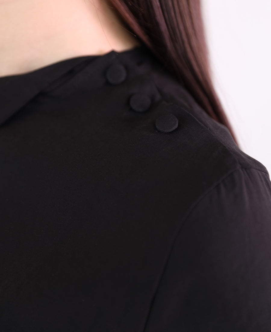 Black set of blouse with tie shoulder buttons and wide leg pants with tie waist