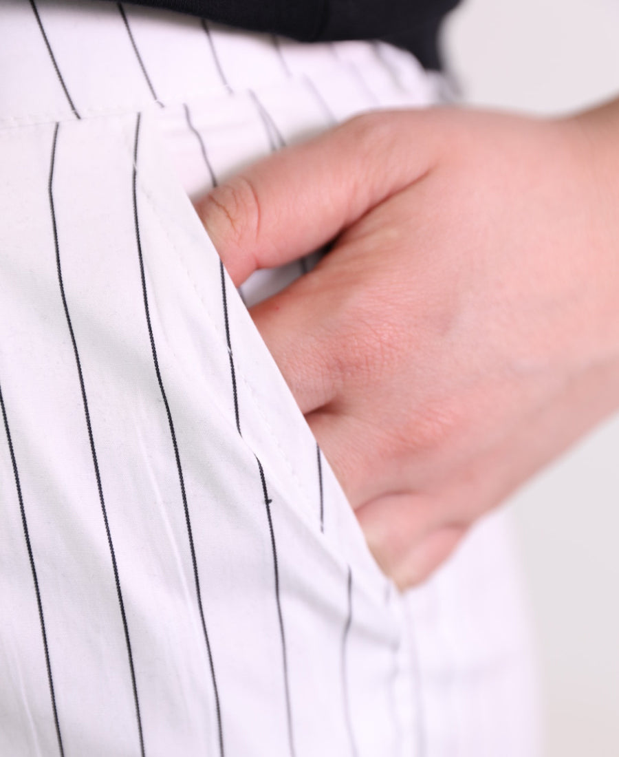 White wide leg trousers with black stripes
