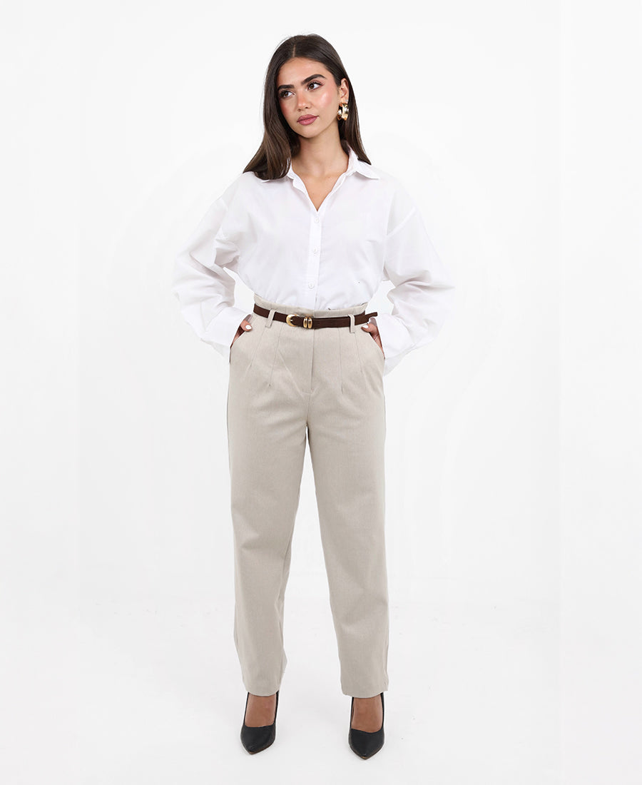 pleated trousers with a brown belt
