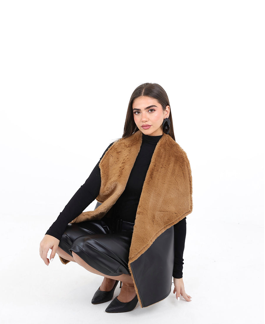 Leather vest on the outside and fur on the inside