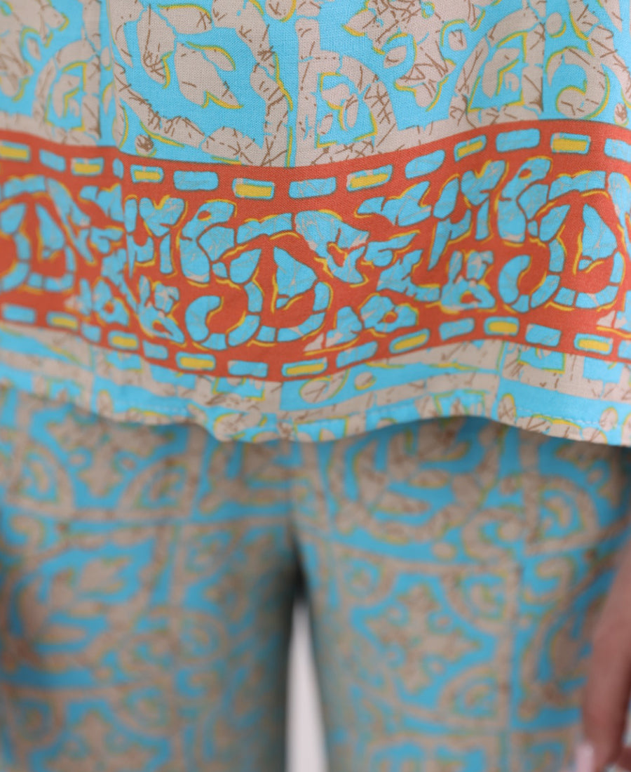 Turquoise-orange set, drilled top with wide trousers
