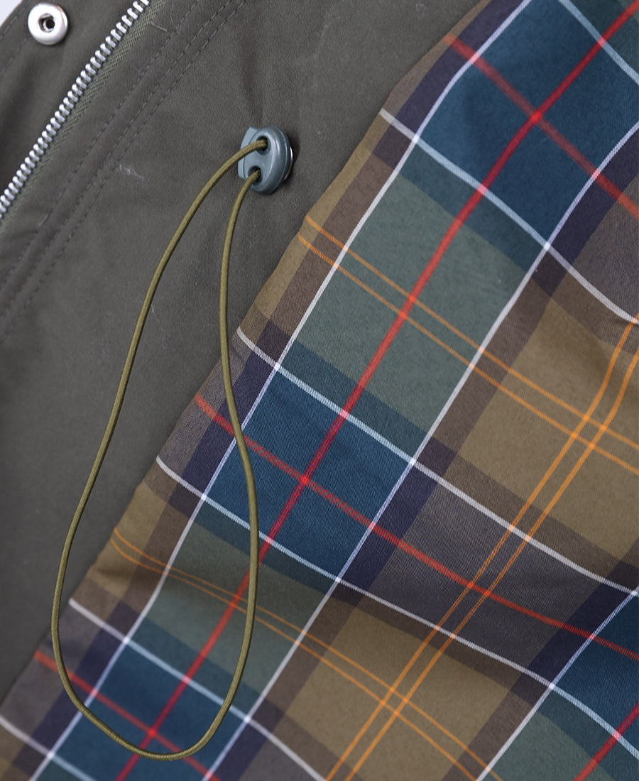 Long jacket with a gathered waist and pocket