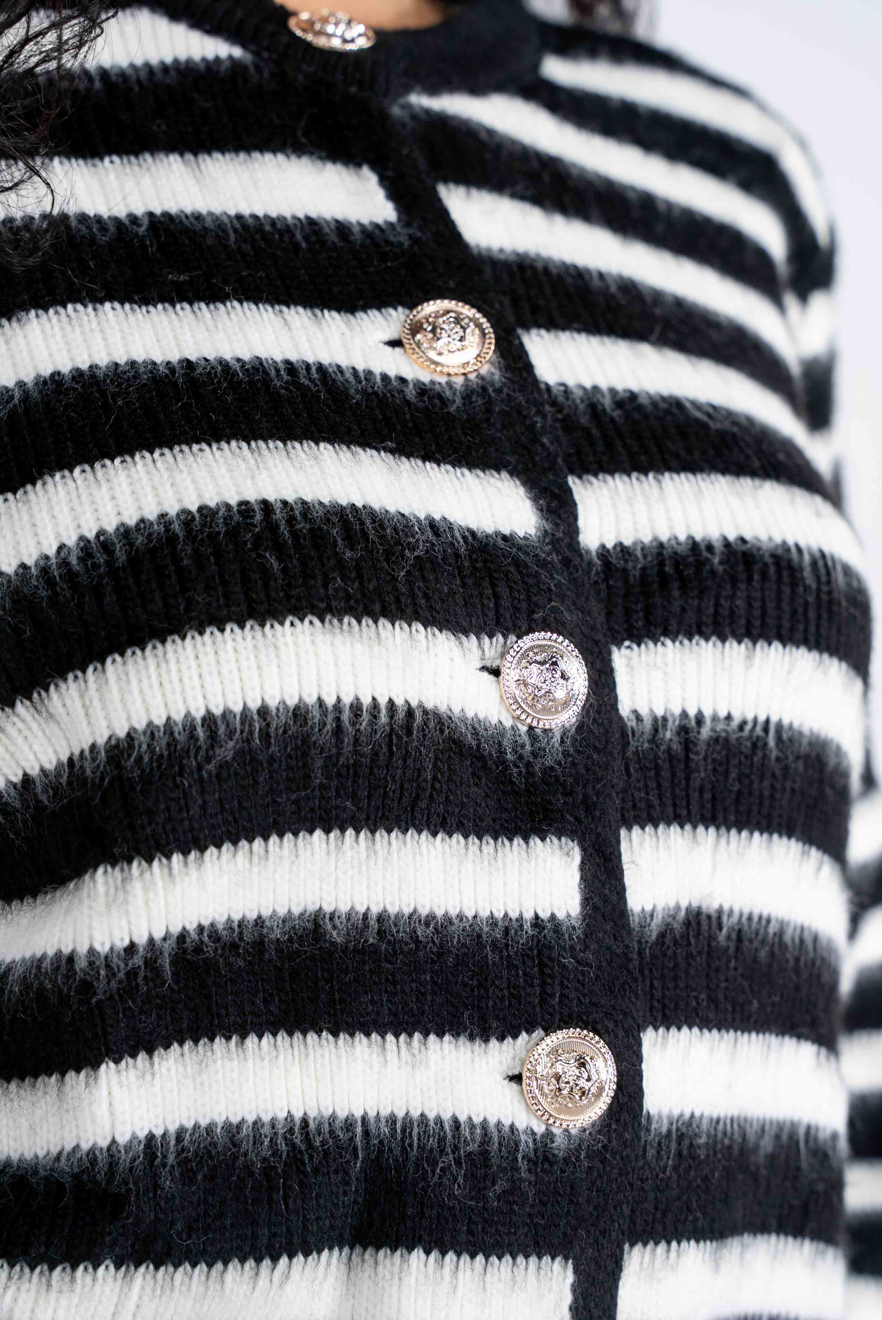 Black and white striped cardigan with gold buttons