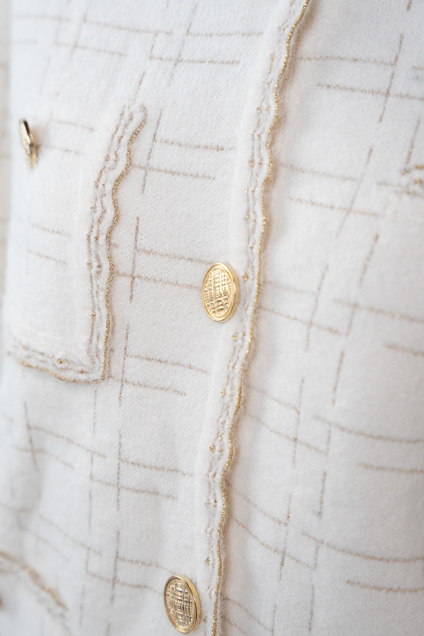 Button-down blouse with gold stripes