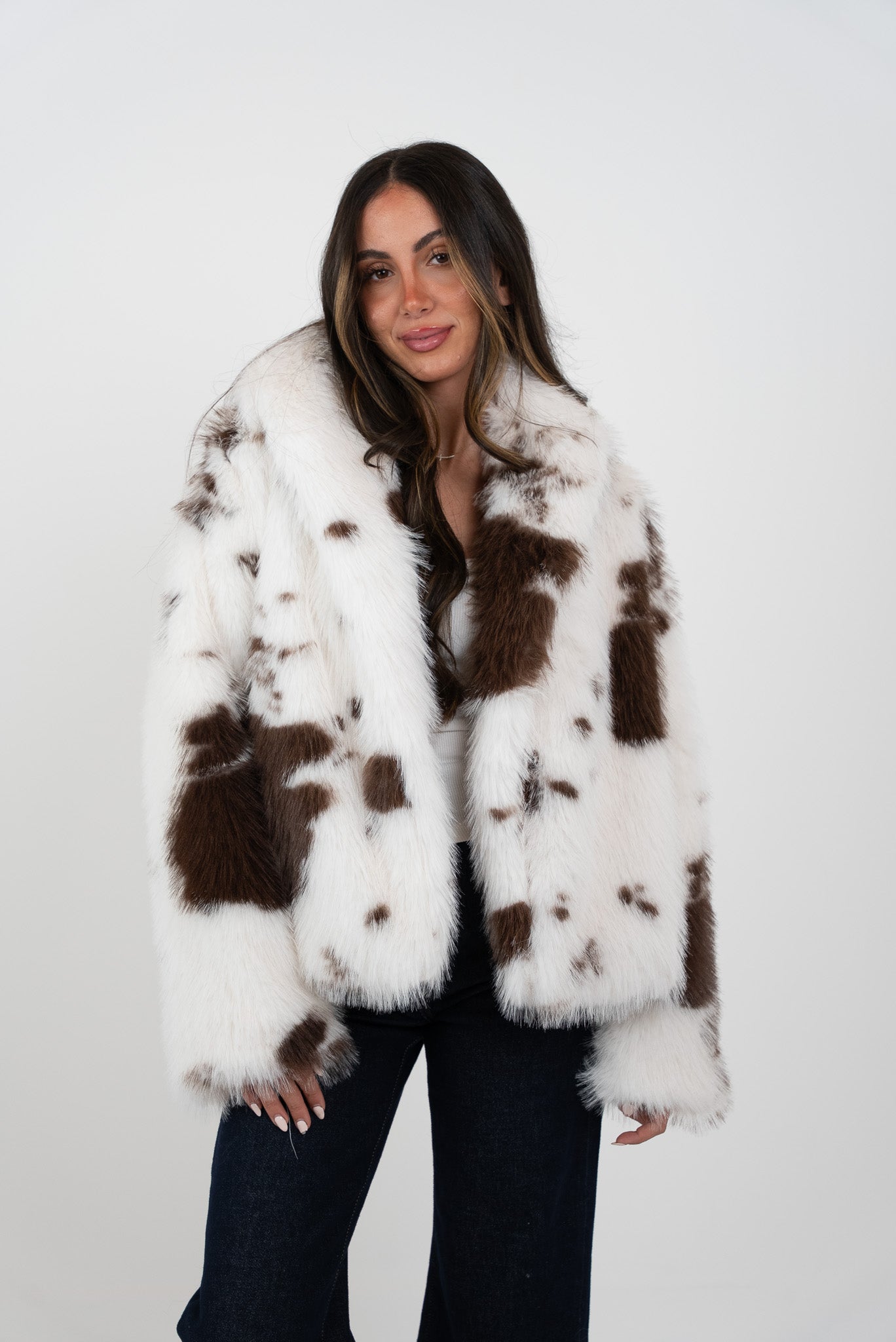 Off-white fur jacket with brown spots