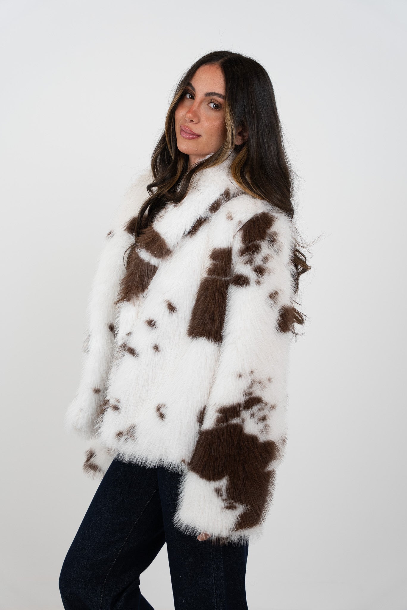 Off-white fur jacket with brown spots