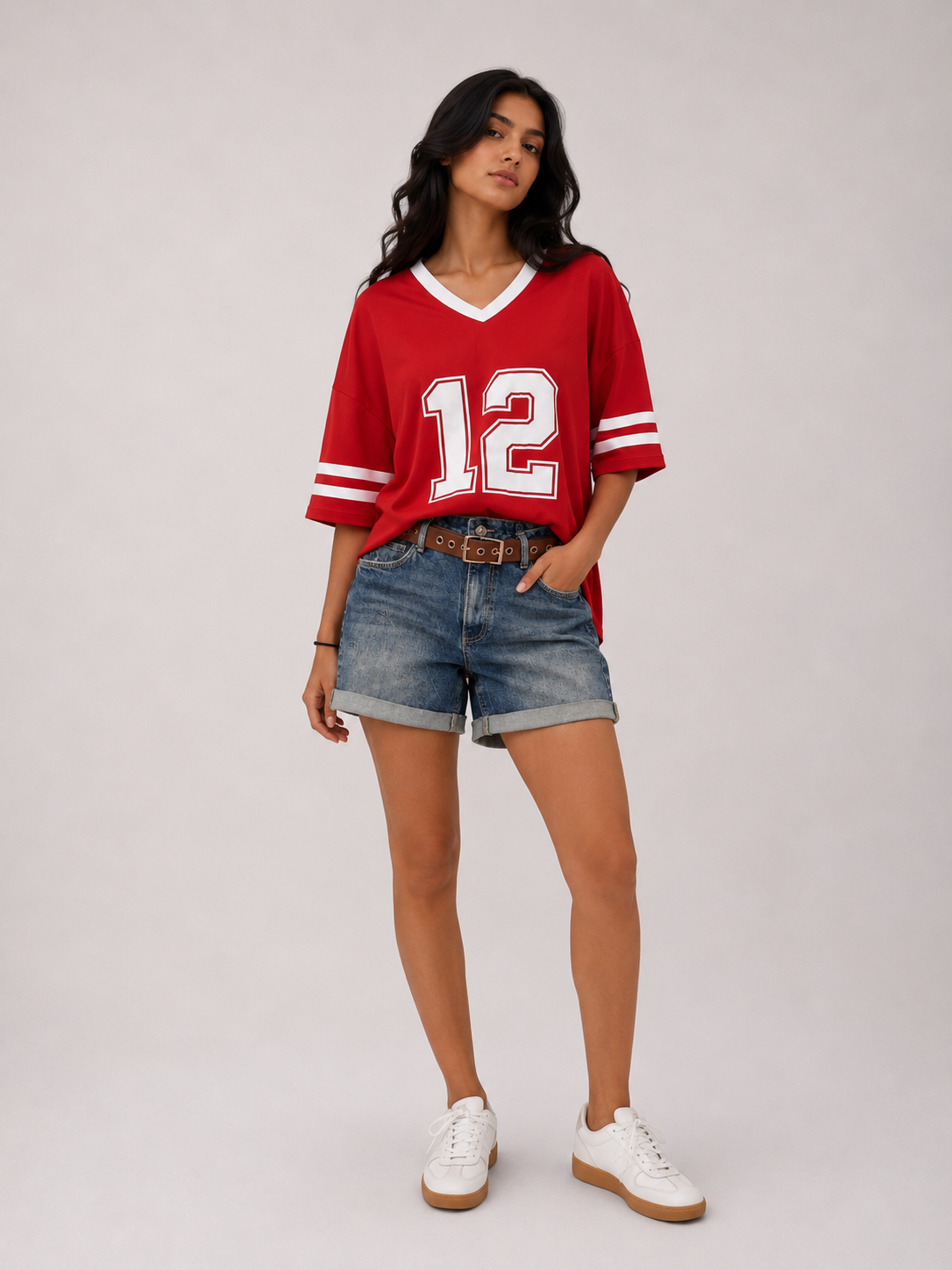 Oversized T-shirt with a print on the front bearing "the number 12", and on the back the phrase "We are 12".