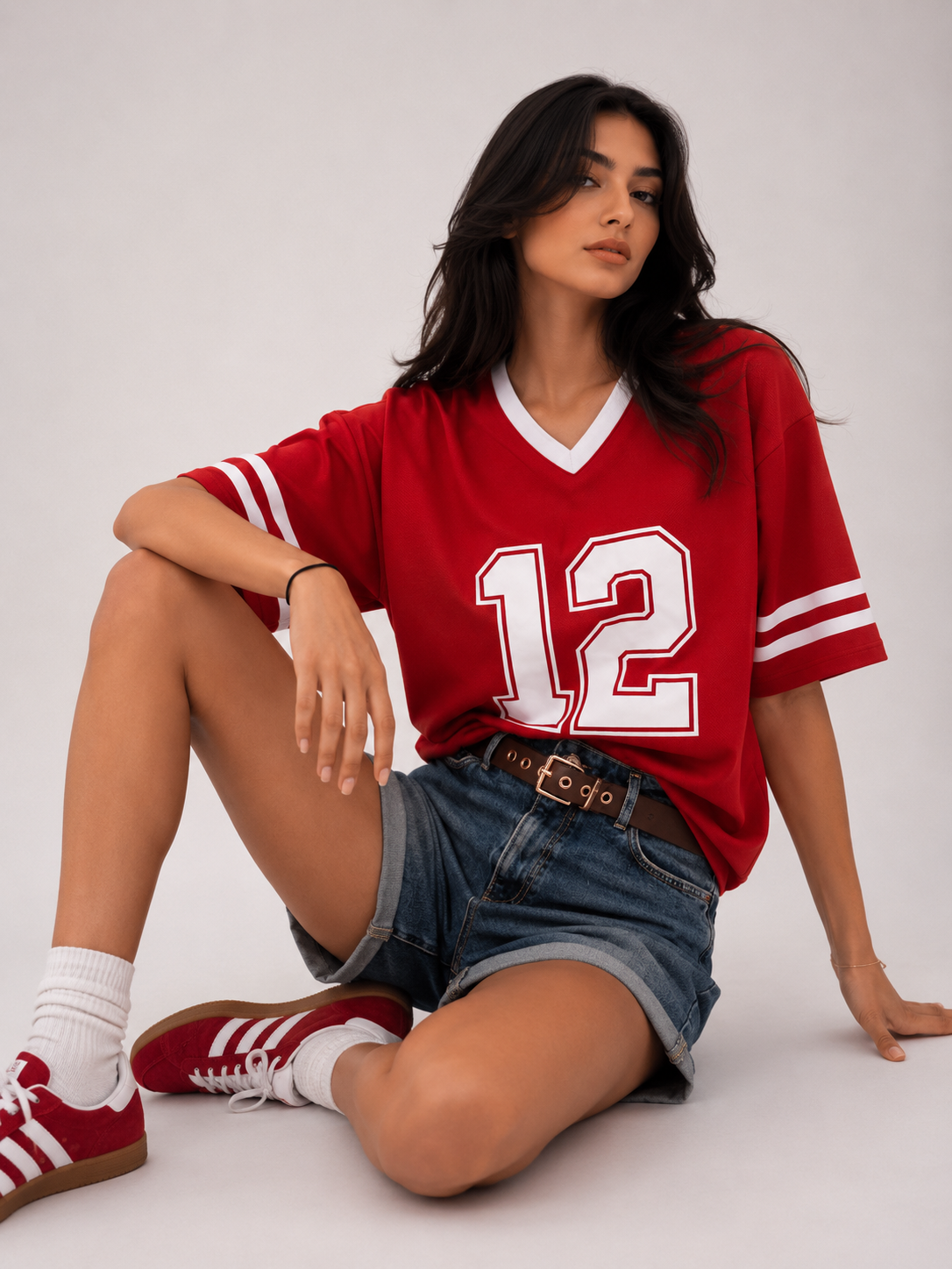 Oversized T-shirt with a print on the front bearing "the number 12", and on the back the phrase "We are 12".