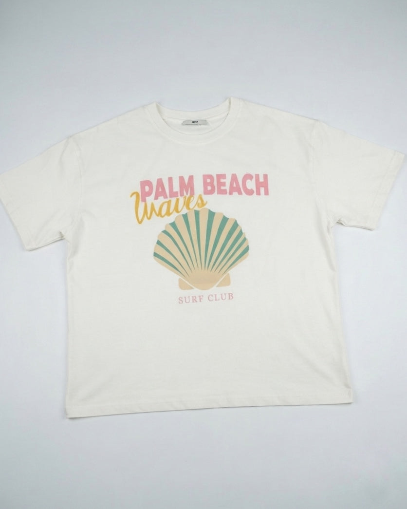 Oversized T-shirt with a seashell graphic.