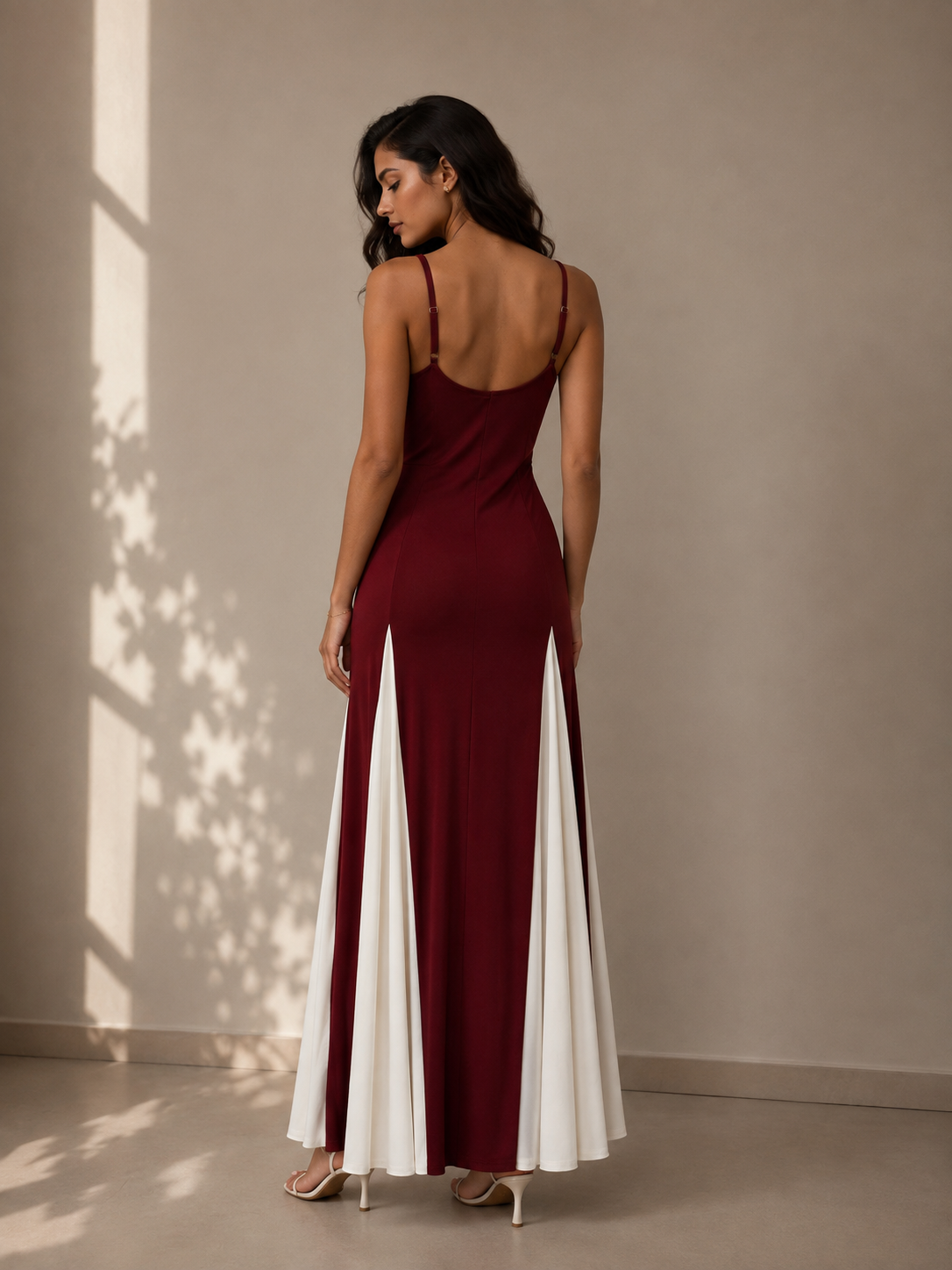 Long strap dress with white stripes at the bottom.