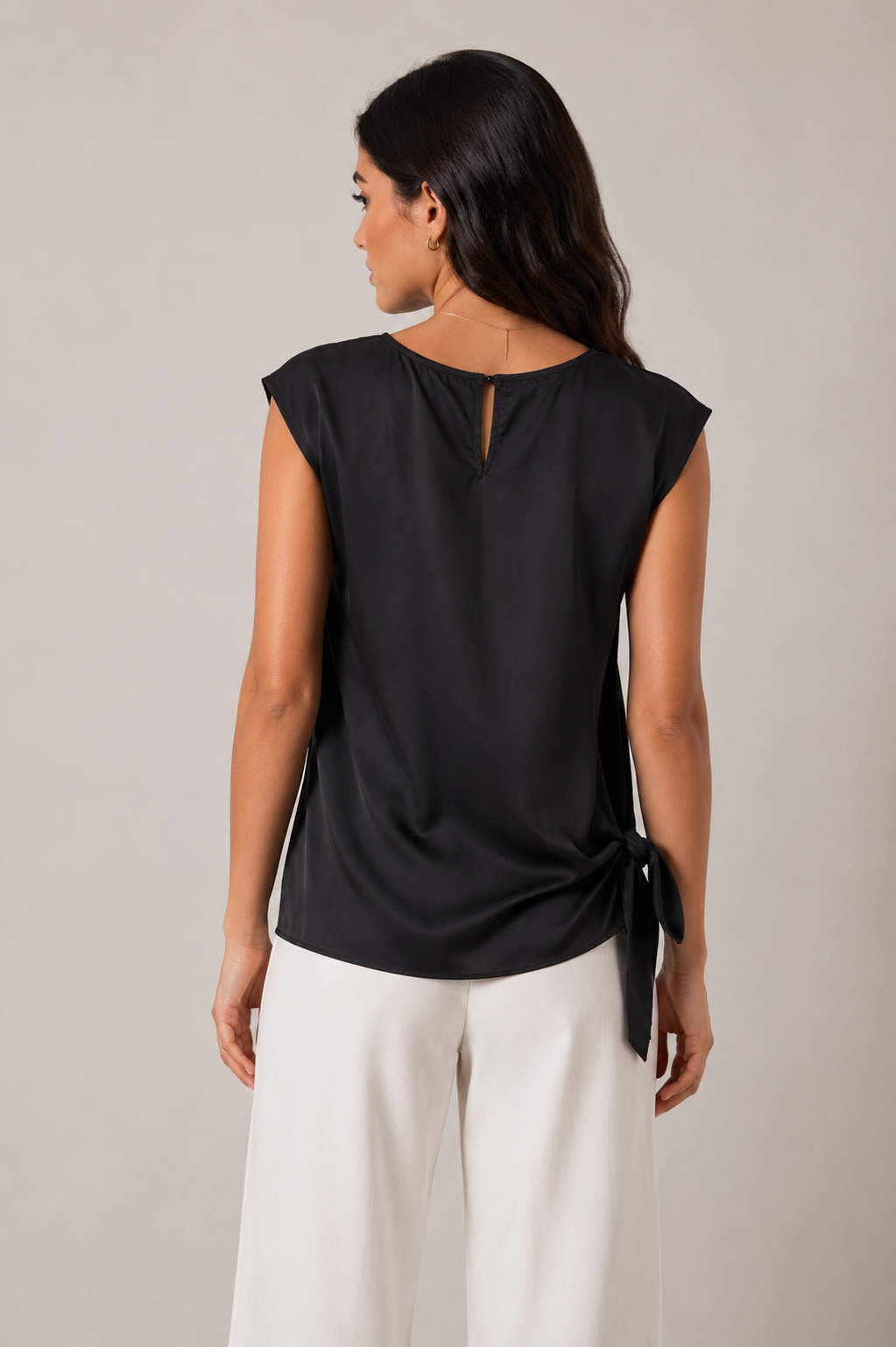 Black sleeveless tie-waist top