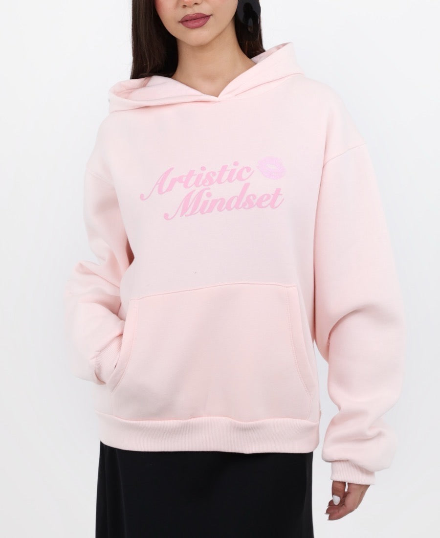 Strawberry hoodie with a kiss-themed message.