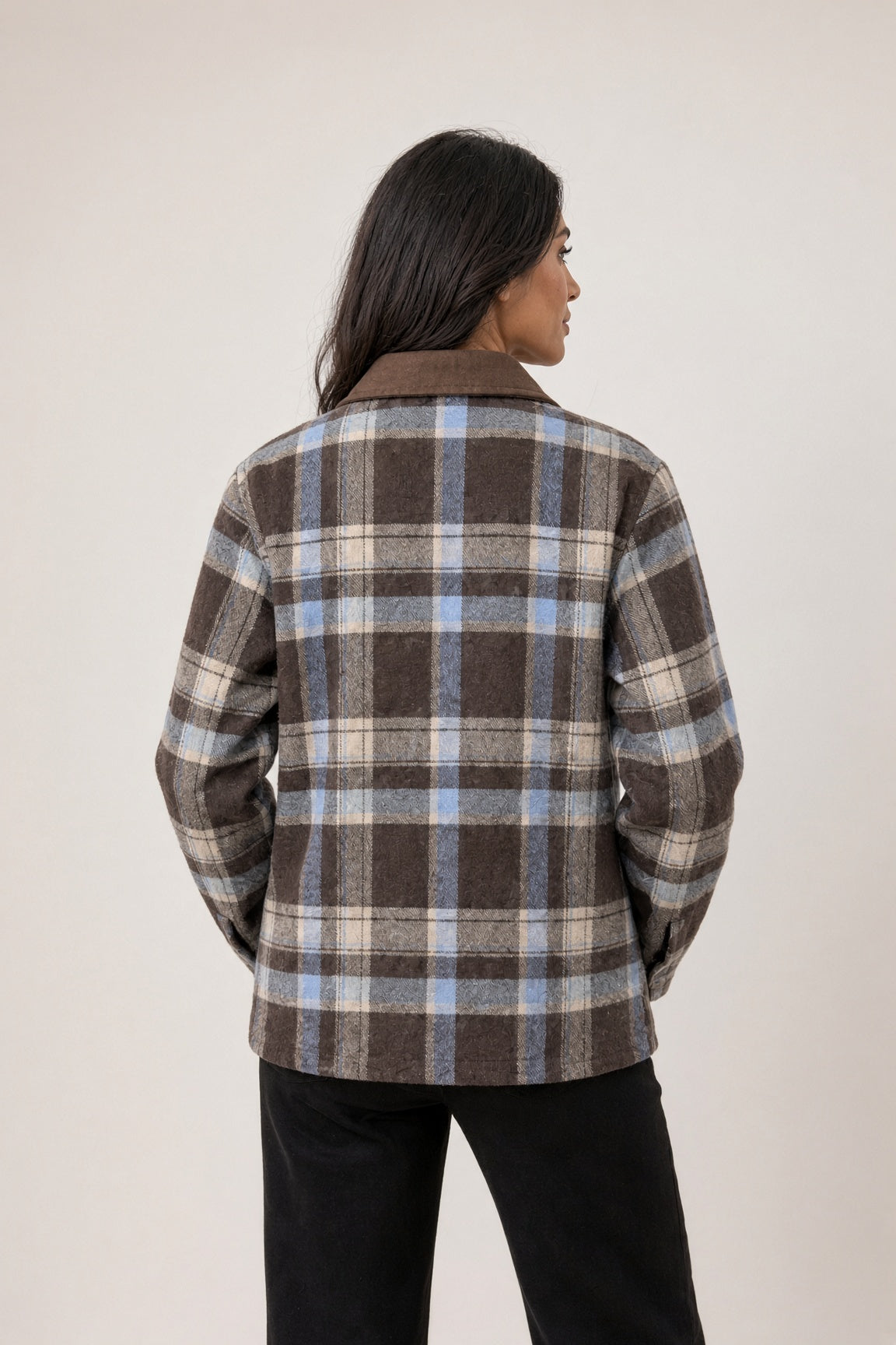 Checkered jacket with a shirt collar, snap-button chest closure, and side pockets.