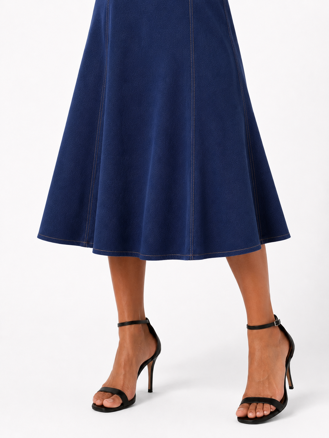 Teal sleeveless midi dress with a V-neck and honey-colored stitching.