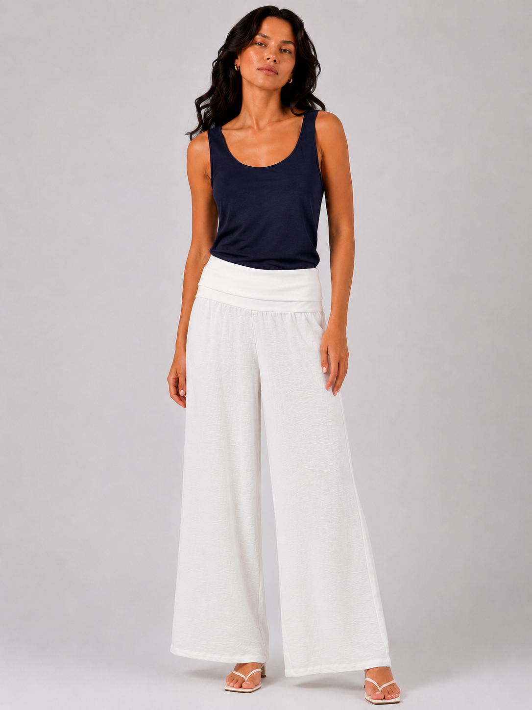Street-cut sweatpants with a fold-over waistband.